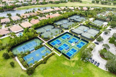Live the ultimate country club lifestyle in this exquisitely on Parkland Golf Club in Florida - for sale on GolfHomes.com, golf home, golf lot