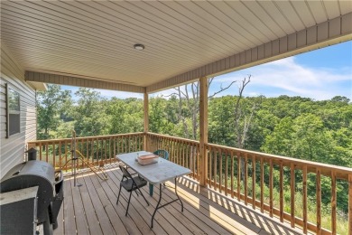 This home is a great home for the outdoor enthusiast! Mountain on Bella Vista - Metfield Golf Complex and Country Club in Arkansas - for sale on GolfHomes.com, golf home, golf lot