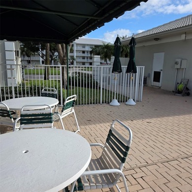 The community offers a breathtaking views of the canal and on The Country Club At Boca Raton in Florida - for sale on GolfHomes.com, golf home, golf lot