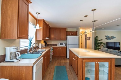 Under contract-accepting backup offers. Welcome to the friendly on Saint Andrews South Golf Club in Florida - for sale on GolfHomes.com, golf home, golf lot