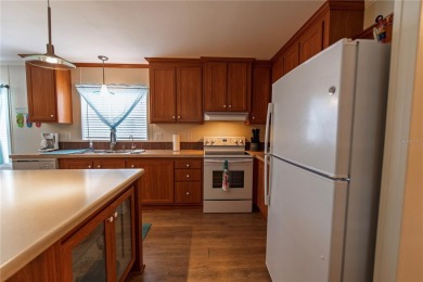 Under contract-accepting backup offers. Welcome to the friendly on Saint Andrews South Golf Club in Florida - for sale on GolfHomes.com, golf home, golf lot