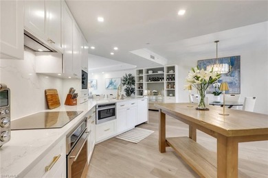 Welcome to this gracious, fully reimagined 2-bedroom plus 2 on Club at Pelican Bay Golf Course in Florida - for sale on GolfHomes.com, golf home, golf lot