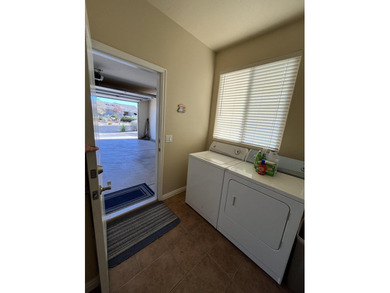 Located in the Coral Canyon golf-course community, this 2,343 sq on Coral Canyon Golf Course in Utah - for sale on GolfHomes.com, golf home, golf lot