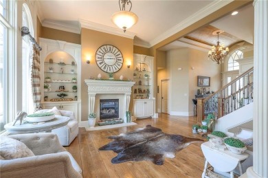 Welcome to this exceptional 1.5-story residence nestled in the on Tiffany Greens Golf Club in Missouri - for sale on GolfHomes.com, golf home, golf lot