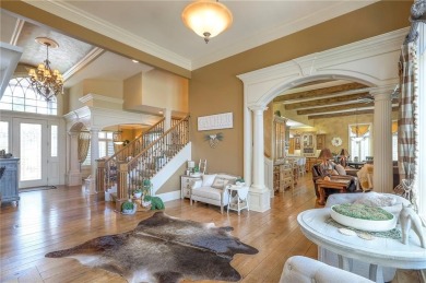Welcome to this exceptional 1.5-story residence nestled in the on Tiffany Greens Golf Club in Missouri - for sale on GolfHomes.com, golf home, golf lot