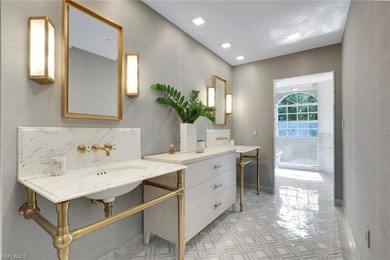 Welcome to this gracious, fully reimagined 2-bedroom plus 2 on Club at Pelican Bay Golf Course in Florida - for sale on GolfHomes.com, golf home, golf lot