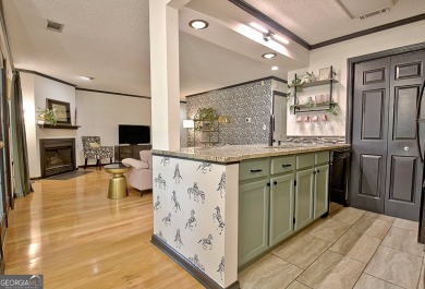 Lakefront Living in the Heart of Peachtree City! Enjoy the ease on Canongate At Flat Creek Club in Georgia - for sale on GolfHomes.com, golf home, golf lot