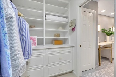 Welcome to this gracious, fully reimagined 2-bedroom plus 2 on Club at Pelican Bay Golf Course in Florida - for sale on GolfHomes.com, golf home, golf lot