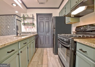 Lakefront Living in the Heart of Peachtree City! Enjoy the ease on Canongate At Flat Creek Club in Georgia - for sale on GolfHomes.com, golf home, golf lot