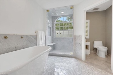 Welcome to this gracious, fully reimagined 2-bedroom plus 2 on Club at Pelican Bay Golf Course in Florida - for sale on GolfHomes.com, golf home, golf lot