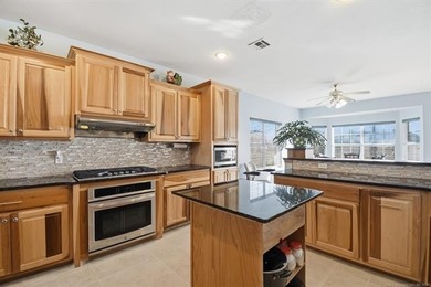 Spacious 5-bedroom, 3.5-bath, 2-story brick home on a large on Bailey Ranch Golf Club in Oklahoma - for sale on GolfHomes.com, golf home, golf lot