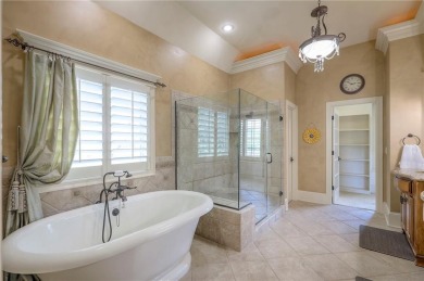 Welcome to this exceptional 1.5-story residence nestled in the on Tiffany Greens Golf Club in Missouri - for sale on GolfHomes.com, golf home, golf lot