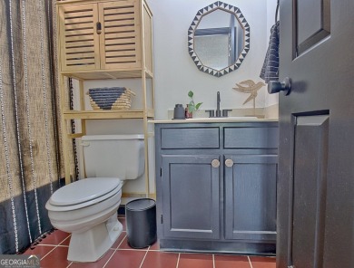 Lakefront Living in the Heart of Peachtree City! Enjoy the ease on Canongate At Flat Creek Club in Georgia - for sale on GolfHomes.com, golf home, golf lot