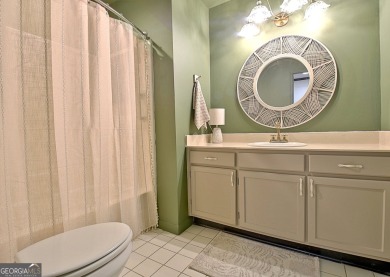 Lakefront Living in the Heart of Peachtree City! Enjoy the ease on Canongate At Flat Creek Club in Georgia - for sale on GolfHomes.com, golf home, golf lot
