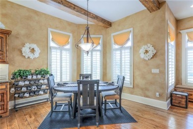 Welcome to this exceptional 1.5-story residence nestled in the on Tiffany Greens Golf Club in Missouri - for sale on GolfHomes.com, golf home, golf lot