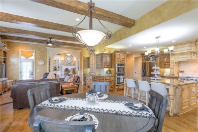 Welcome to this exceptional 1.5-story residence nestled in the on Tiffany Greens Golf Club in Missouri - for sale on GolfHomes.com, golf home, golf lot
