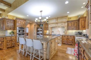 Welcome to this exceptional 1.5-story residence nestled in the on Tiffany Greens Golf Club in Missouri - for sale on GolfHomes.com, golf home, golf lot