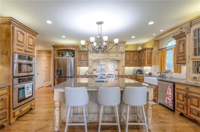 Welcome to this exceptional 1.5-story residence nestled in the on Tiffany Greens Golf Club in Missouri - for sale on GolfHomes.com, golf home, golf lot