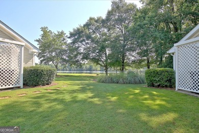 Lakefront Living in the Heart of Peachtree City! Enjoy the ease on Canongate At Flat Creek Club in Georgia - for sale on GolfHomes.com, golf home, golf lot
