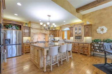 Welcome to this exceptional 1.5-story residence nestled in the on Tiffany Greens Golf Club in Missouri - for sale on GolfHomes.com, golf home, golf lot