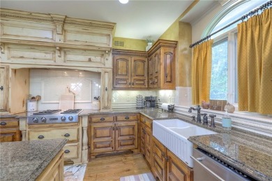 Welcome to this exceptional 1.5-story residence nestled in the on Tiffany Greens Golf Club in Missouri - for sale on GolfHomes.com, golf home, golf lot
