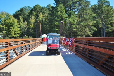Lakefront Living in the Heart of Peachtree City! Enjoy the ease on Canongate At Flat Creek Club in Georgia - for sale on GolfHomes.com, golf home, golf lot