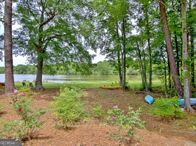 Lakefront Living in the Heart of Peachtree City! Enjoy the ease on Canongate At Flat Creek Club in Georgia - for sale on GolfHomes.com, golf home, golf lot