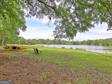 Lakefront Living in the Heart of Peachtree City! Enjoy the ease on Canongate At Flat Creek Club in Georgia - for sale on GolfHomes.com, golf home, golf lot