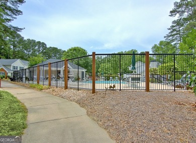 Lakefront Living in the Heart of Peachtree City! Enjoy the ease on Canongate At Flat Creek Club in Georgia - for sale on GolfHomes.com, golf home, golf lot