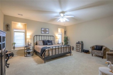 Welcome to this exceptional 1.5-story residence nestled in the on Tiffany Greens Golf Club in Missouri - for sale on GolfHomes.com, golf home, golf lot