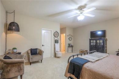 Welcome to this exceptional 1.5-story residence nestled in the on Tiffany Greens Golf Club in Missouri - for sale on GolfHomes.com, golf home, golf lot