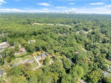 Beautifully designed 2-story home in the charming Adams Park on Alfred Tup Holmes Golf Course in Georgia - for sale on GolfHomes.com, golf home, golf lot