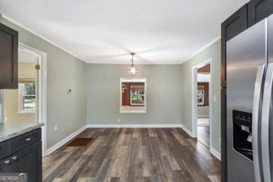 Nestled in the heart of Shellman Bluff, this two bedroom/two on Sapelo Hammock Golf Club in Georgia - for sale on GolfHomes.com, golf home, golf lot