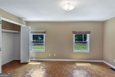 Nestled in the heart of Shellman Bluff, this two bedroom/two on Sapelo Hammock Golf Club in Georgia - for sale on GolfHomes.com, golf home, golf lot