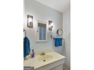 Nestled in the heart of Shellman Bluff, this two bedroom/two on Sapelo Hammock Golf Club in Georgia - for sale on GolfHomes.com, golf home, golf lot