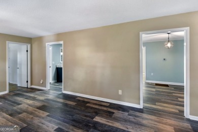Nestled in the heart of Shellman Bluff, this two bedroom/two on Sapelo Hammock Golf Club in Georgia - for sale on GolfHomes.com, golf home, golf lot