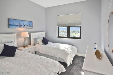 Palmas Del Sol's luxurious high-rise living awaits in this on Gulf Harbour Yacht and Country Club in Florida - for sale on GolfHomes.com, golf home, golf lot