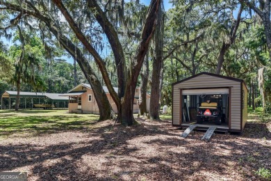 Nestled in the heart of Shellman Bluff, this two bedroom/two on Sapelo Hammock Golf Club in Georgia - for sale on GolfHomes.com, golf home, golf lot
