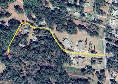 Nestled in the heart of Shellman Bluff, this two bedroom/two on Sapelo Hammock Golf Club in Georgia - for sale on GolfHomes.com, golf home, golf lot