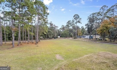 Nestled in the heart of Shellman Bluff, this two bedroom/two on Sapelo Hammock Golf Club in Georgia - for sale on GolfHomes.com, golf home, golf lot