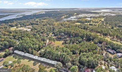 Nestled in the heart of Shellman Bluff, this two bedroom/two on Sapelo Hammock Golf Club in Georgia - for sale on GolfHomes.com, golf home, golf lot