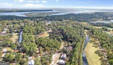 Nestled in the heart of Shellman Bluff, this two bedroom/two on Sapelo Hammock Golf Club in Georgia - for sale on GolfHomes.com, golf home, golf lot