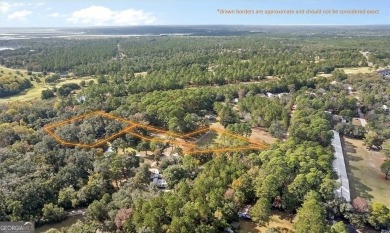 Nestled in the heart of Shellman Bluff, this two bedroom/two on Sapelo Hammock Golf Club in Georgia - for sale on GolfHomes.com, golf home, golf lot