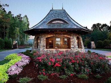 Nestled in the prestigious Hasentree Community this exceptional on Hasentree Club in North Carolina - for sale on GolfHomes.com, golf home, golf lot