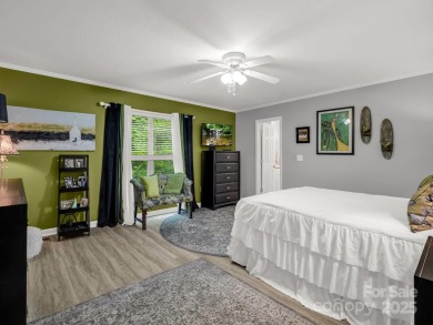 Move-in ready w/many updates, low maintenance yard & seasonal on Rumbling Bald Resort on Lake Lure in North Carolina - for sale on GolfHomes.com, golf home, golf lot