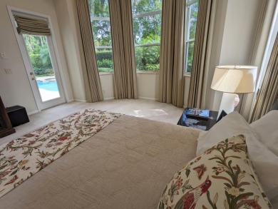 This beautifully designed single-story home is 4 BR plus office on BallenIsles Golf and Country Club in Florida - for sale on GolfHomes.com, golf home, golf lot
