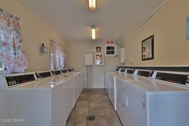 Remodeled 2 bedroom, 2 bath second floor condo offering 910 on Daytona Beach Golf Club in Florida - for sale on GolfHomes.com, golf home, golf lot