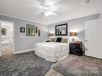 Move-in ready w/many updates, low maintenance yard & seasonal on Rumbling Bald Resort on Lake Lure in North Carolina - for sale on GolfHomes.com, golf home, golf lot