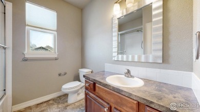 Experience the best of both worlds: watch golfers tee off across on Highland Meadows Golf Course in Colorado - for sale on GolfHomes.com, golf home, golf lot