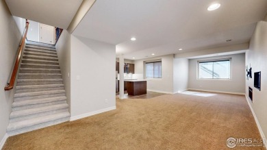 Experience the best of both worlds: watch golfers tee off across on Highland Meadows Golf Course in Colorado - for sale on GolfHomes.com, golf home, golf lot